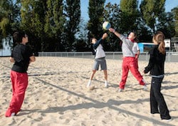 students playing volleyball in vidy lausanne